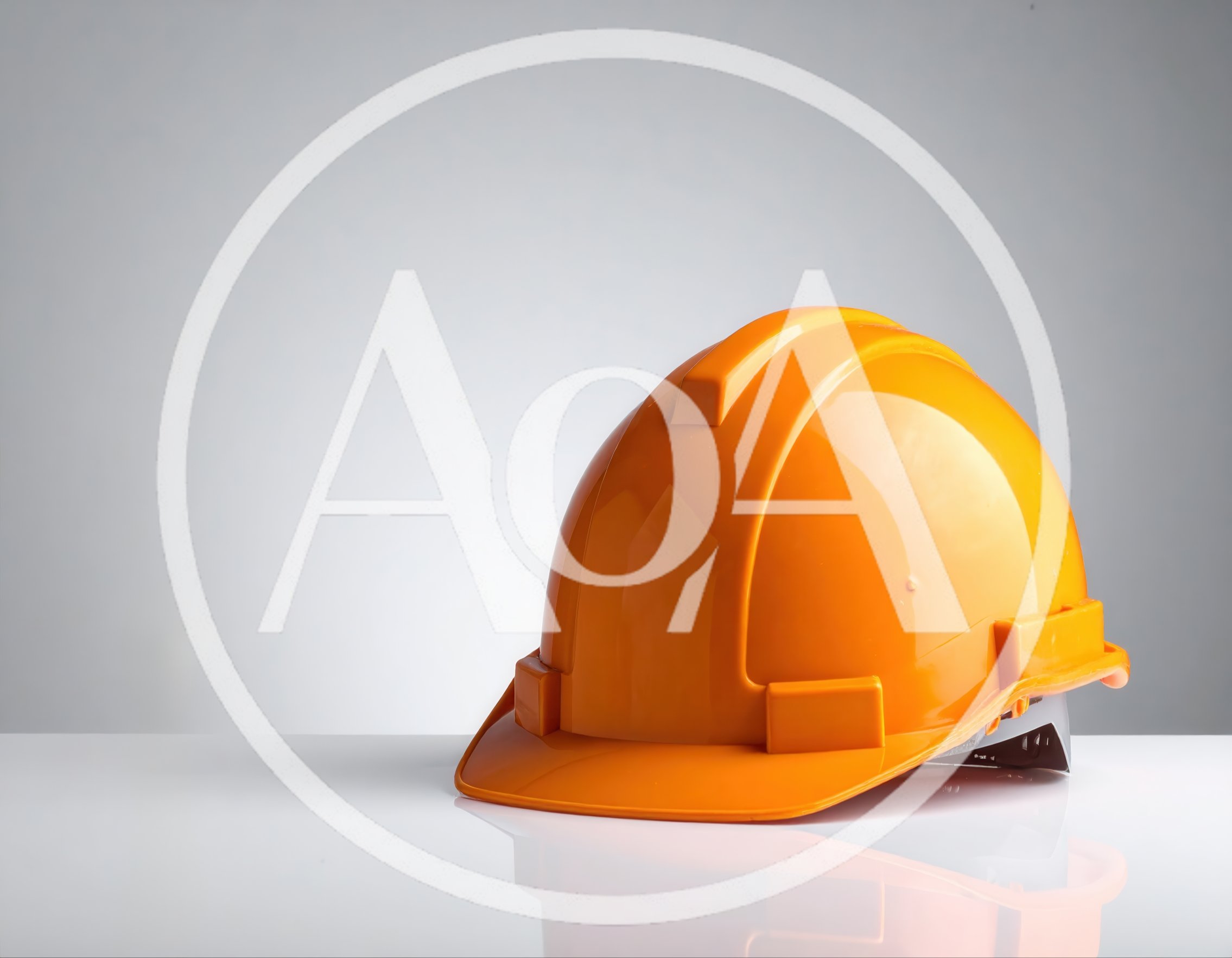 Orange Construction Hard Hat On White Surface