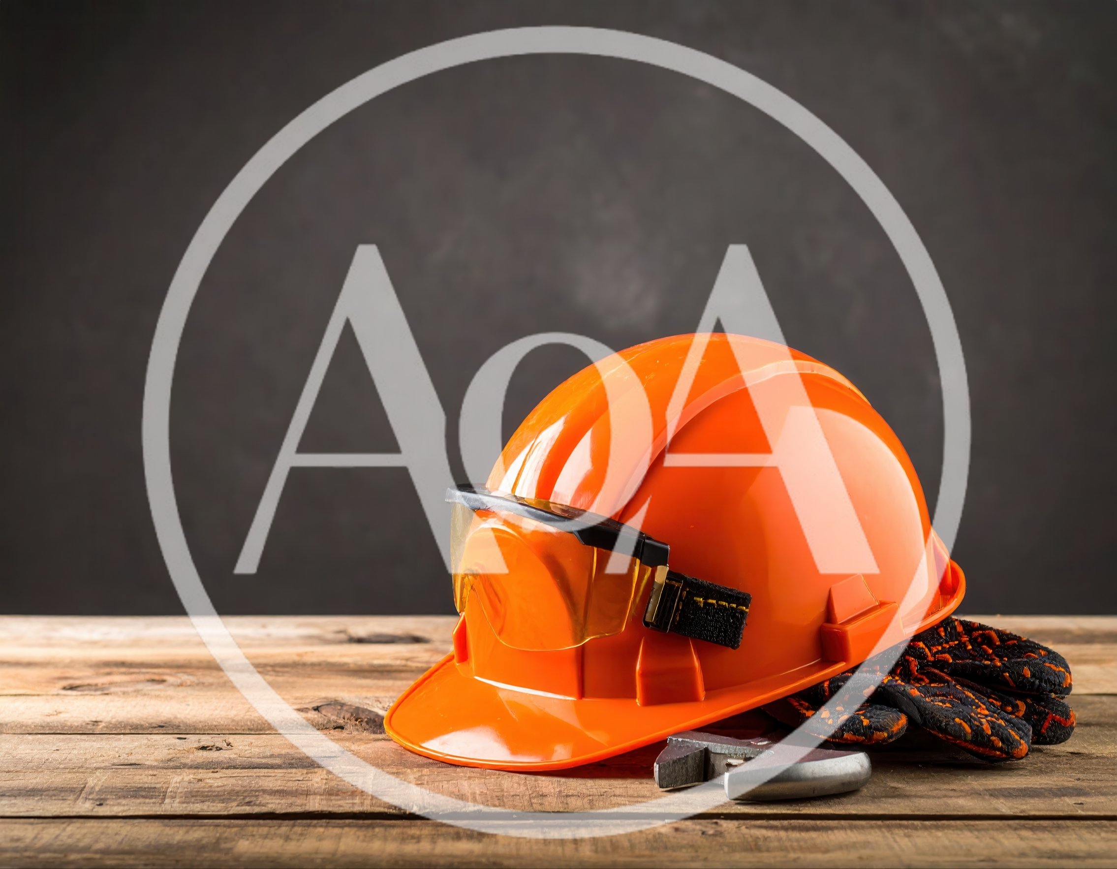 Construction Safety Equipment on Wooden Table