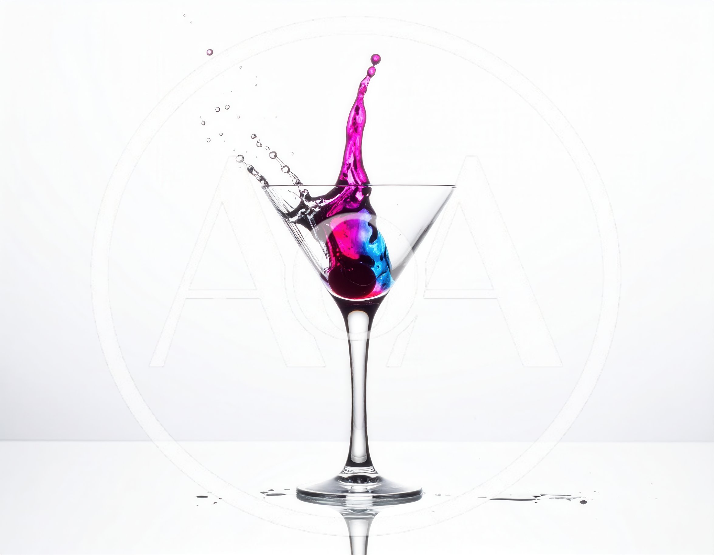 Vibrant Pink and Blue Liquid Splash in Martini Glass