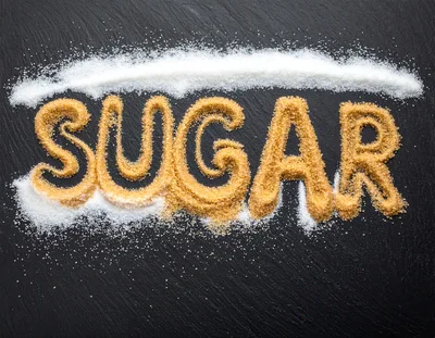 Brown Sugar Text On Dark Slate Background