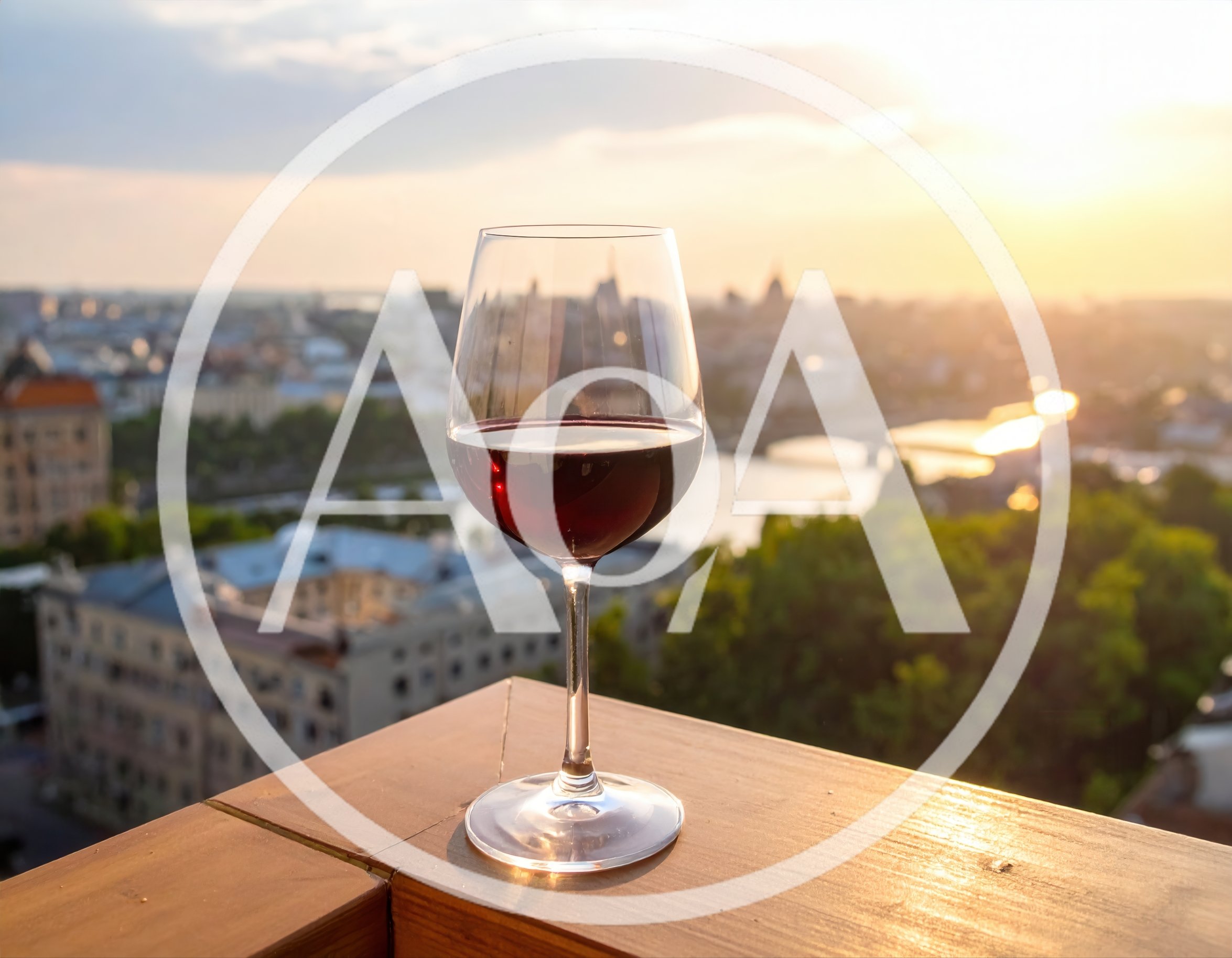 Glass Of Red Wine On A Rooftop At Sunset