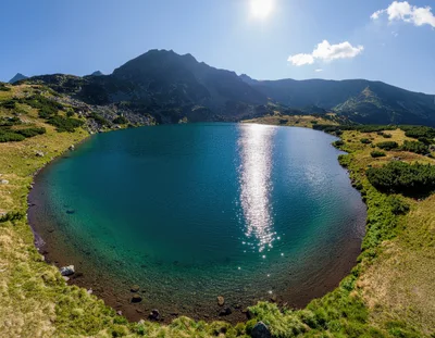 Panoramic View Of A Pristine Alpine Lake