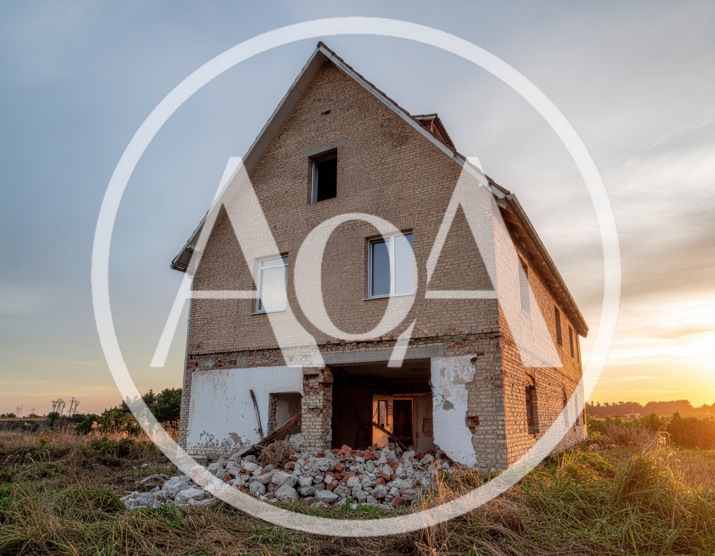 Abandoned Unfinished Brick House At Sunset