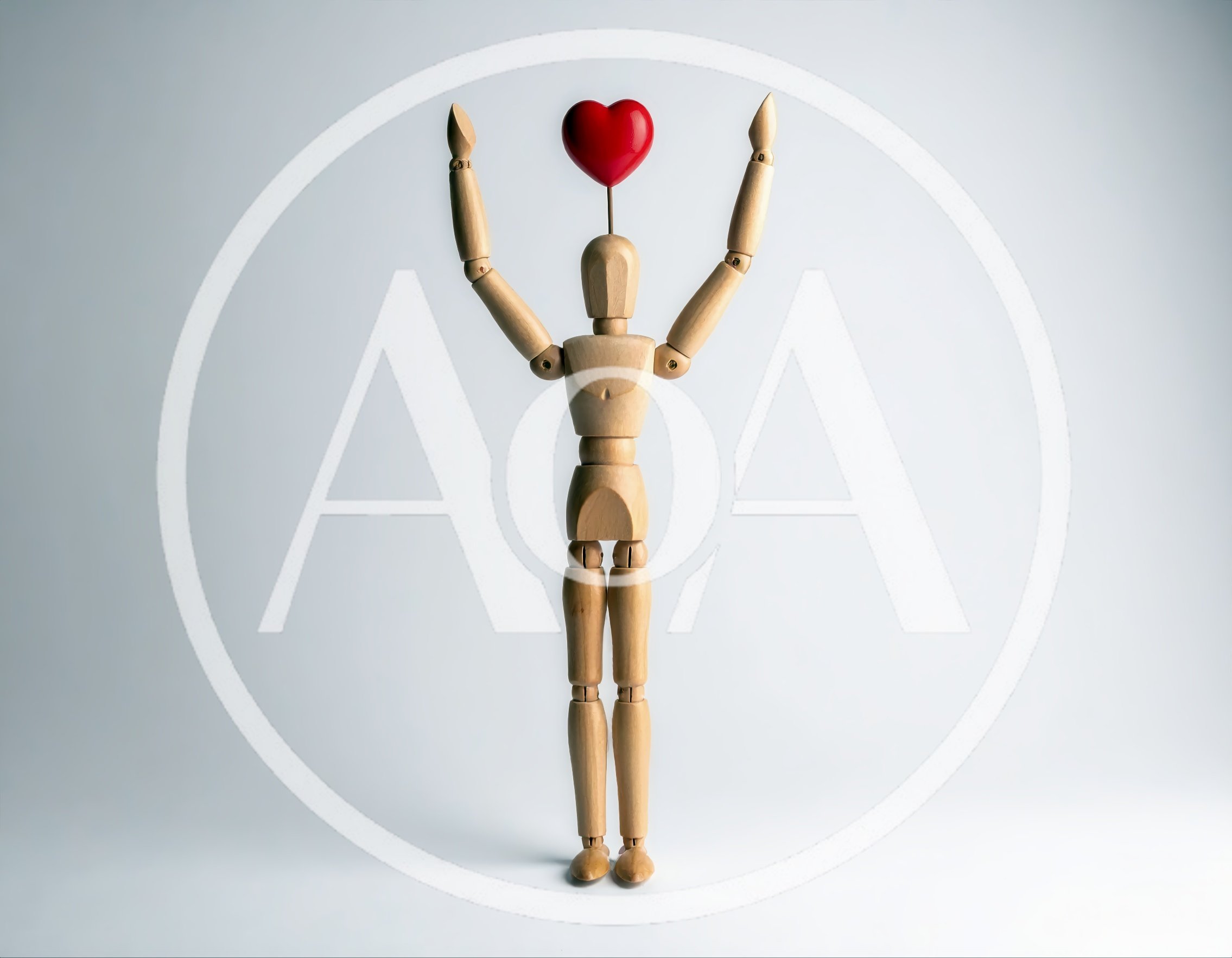 Wooden Mannequin Holding A Red Heart