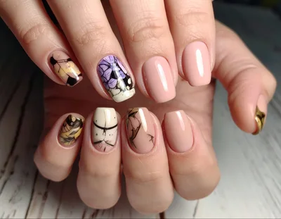 Manicured Hands With Artistic Nail Art Designs