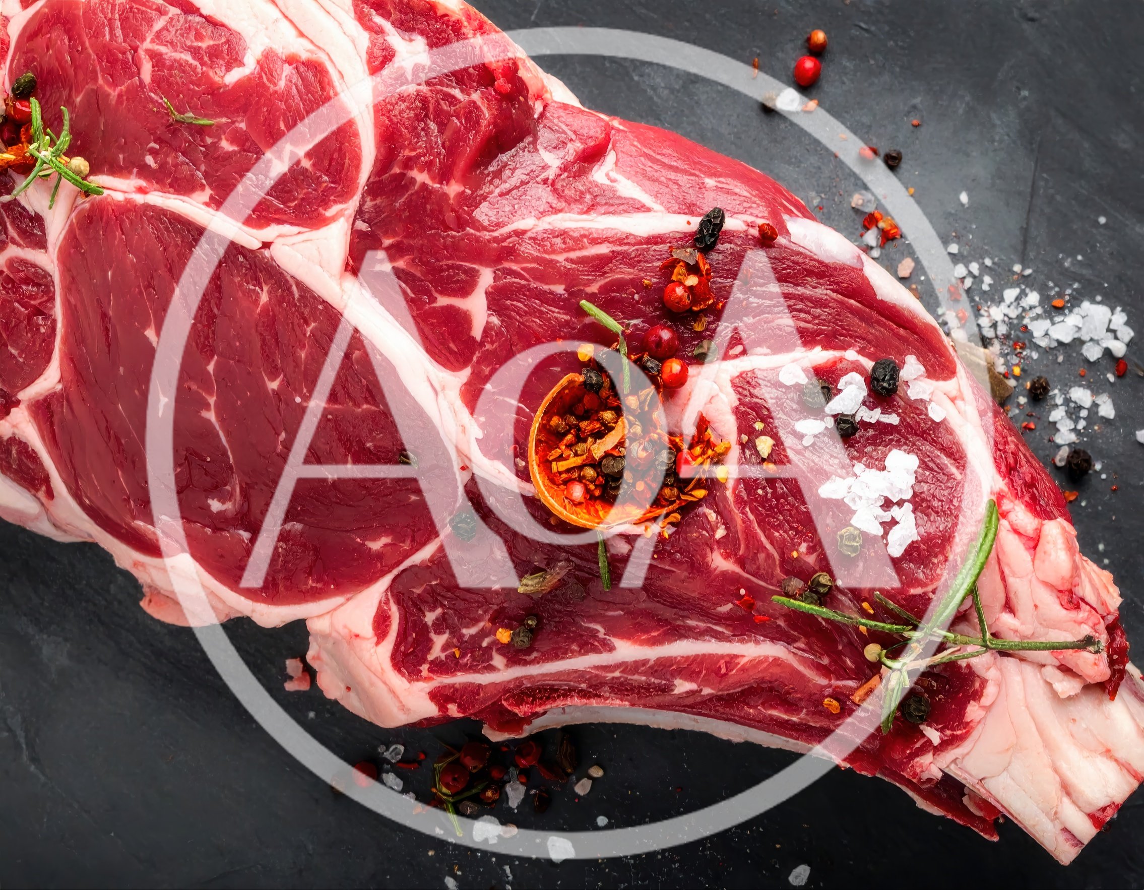 Raw Ribeye Steak With Spices And Rosemary
