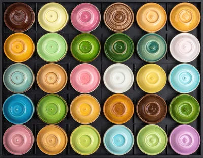 Top View Of Colorful Ceramic Tea Bowls In A Tray