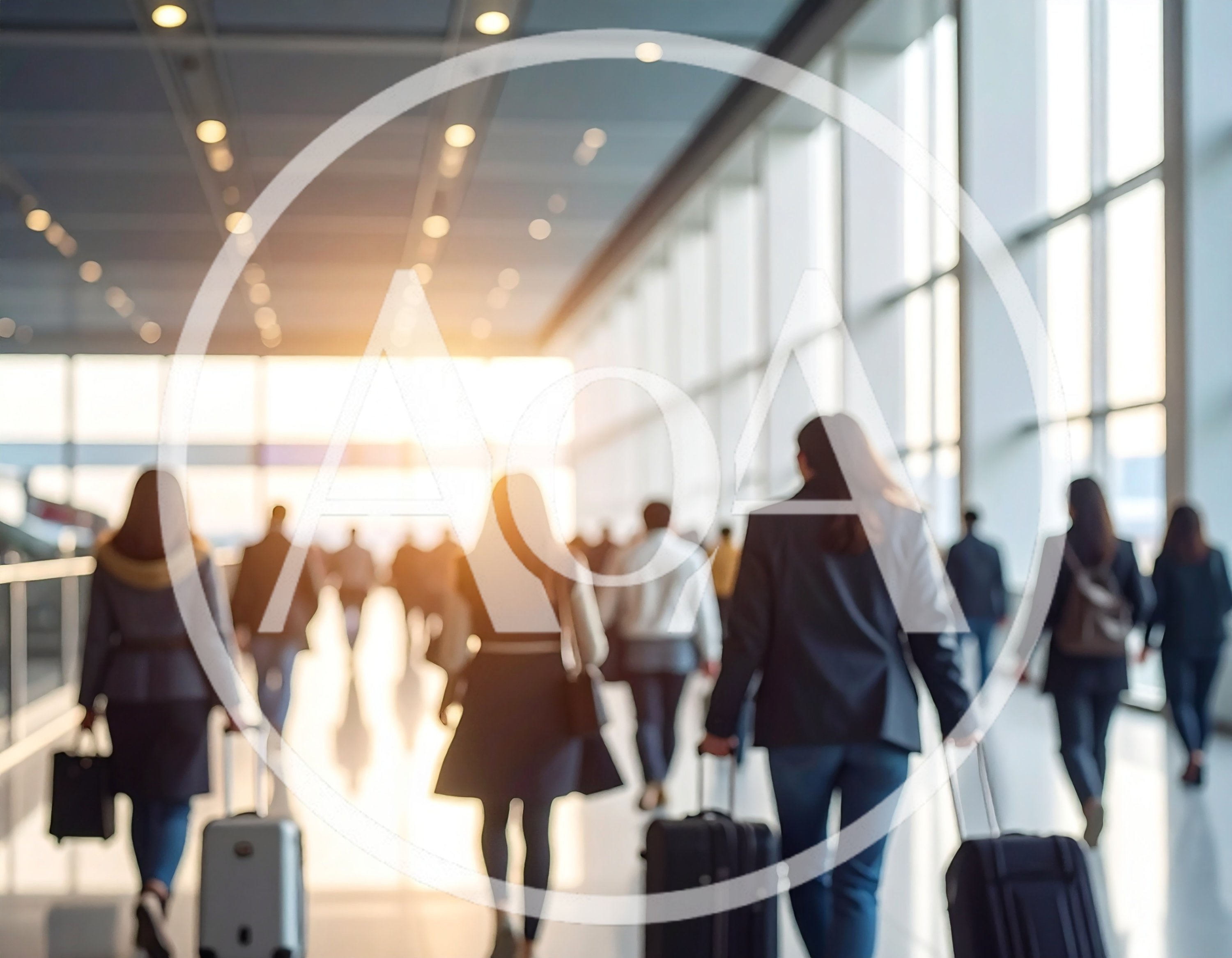 Commuters Walking Through A Bright Modern Airport Terminal