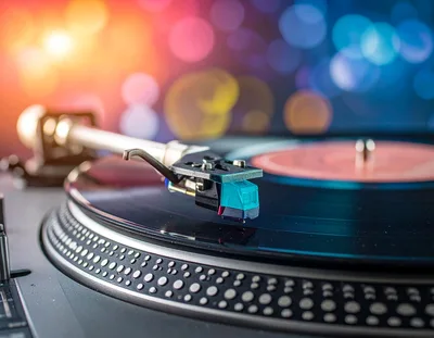 Close Up Of A Turntable Tonearm On Vinyl Record