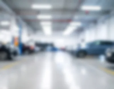 Blurred View Of A Modern Automotive Repair Workshop