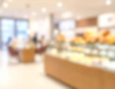 Blurred Interior View Of A Modern Bakery Cafe