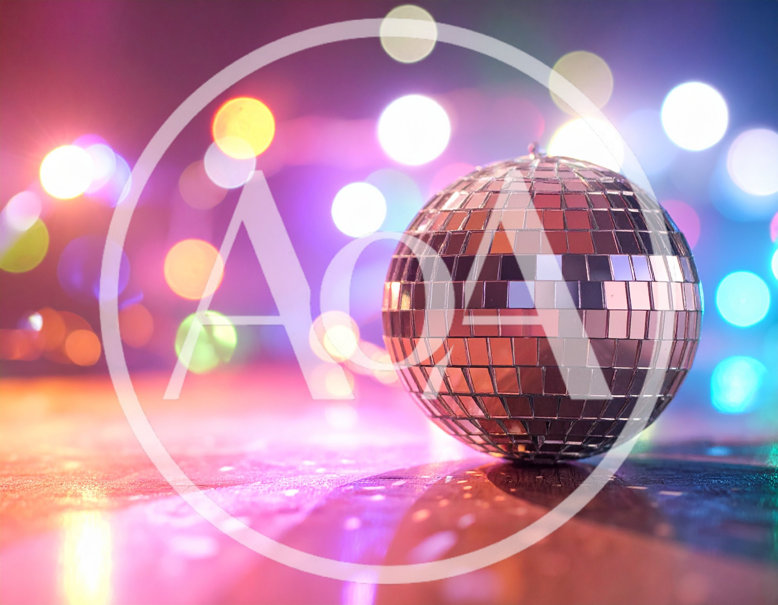Disco Ball Resting On A Reflective Surface