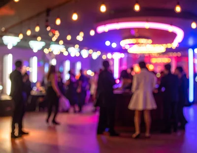 Blurred People Socializing at an Evening Event
