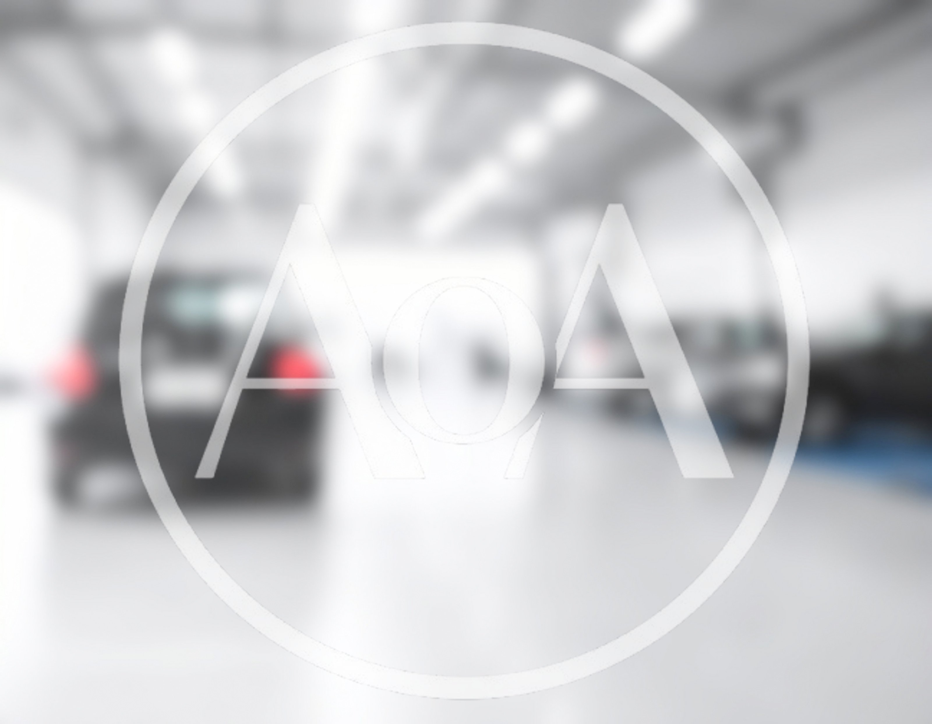 Blurred View of Cars Inside a Modern Auto Workshop