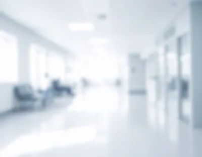 Blurred Hospital Corridor With Waiting Area