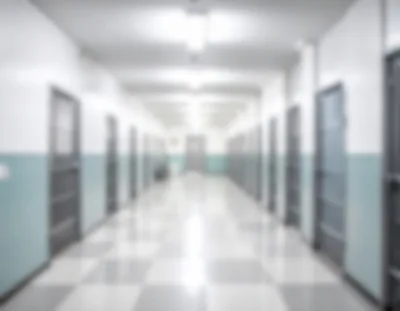 Blurred View Of A Long Prison Hallway