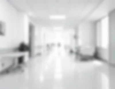 Blurred Hospital Corridor With Medical Equipment