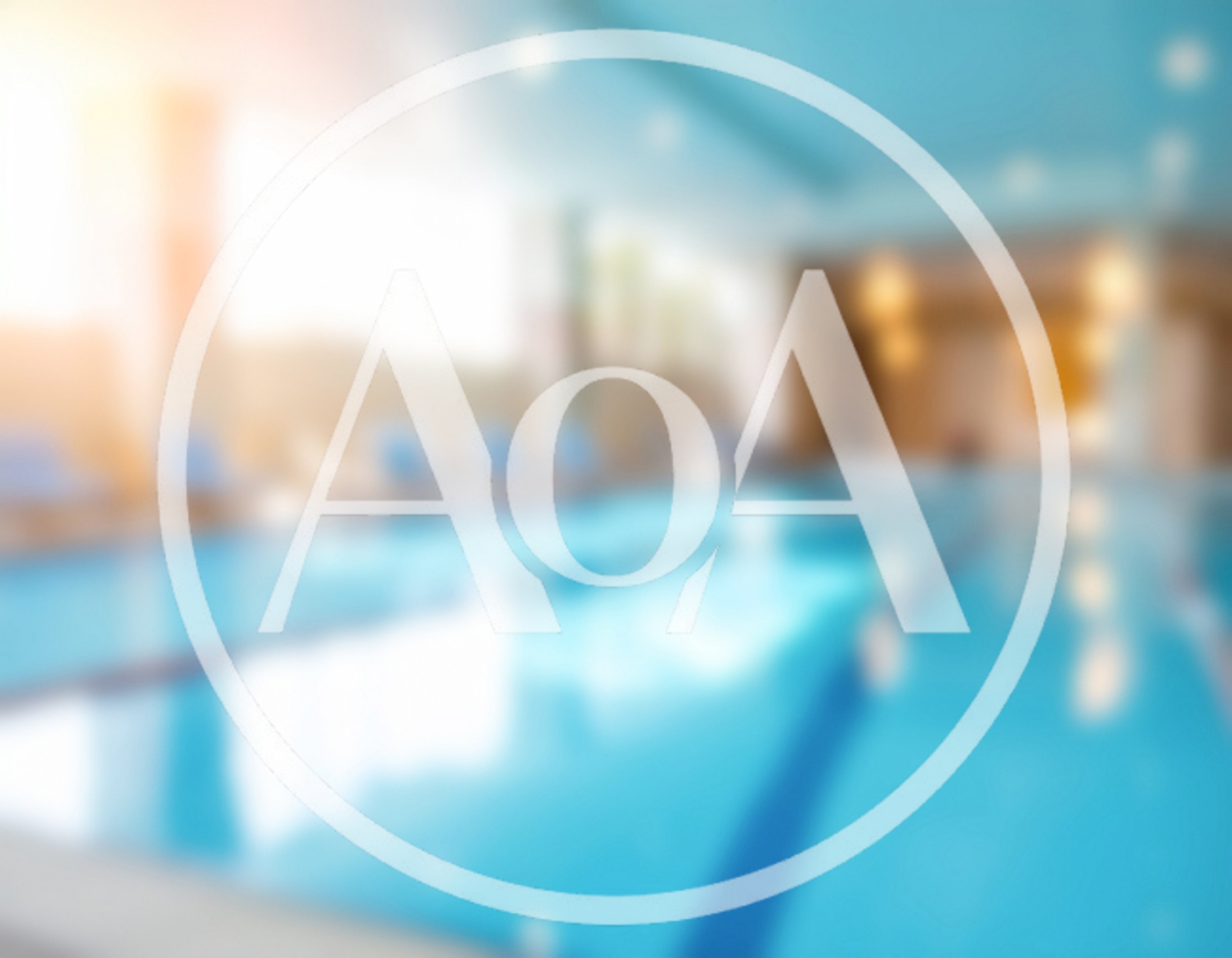 Blurred Indoor Swimming Pool With Lounge Chairs