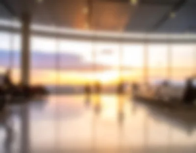 Blurred Airport Terminal Interior At Sunset