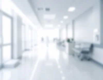Blurred Hospital Corridor With Bright Natural Lighting