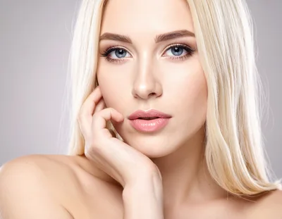 Portrait Of A Beautiful Blonde Woman With Natural Makeup