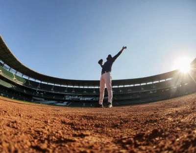 Baseball Player Celebrating Victory On Stadium Field