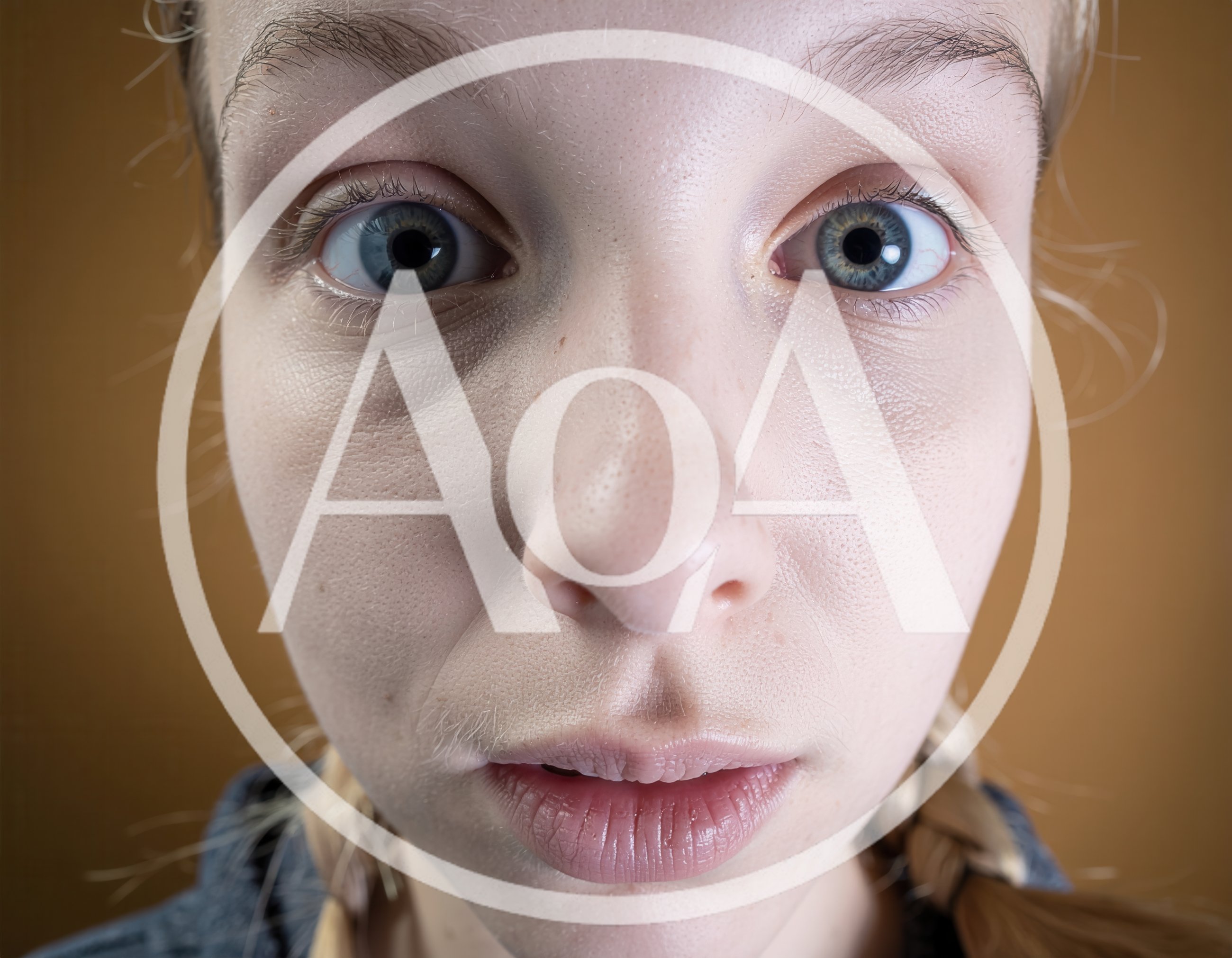 Close Up Portrait Of A Young Woman With Wide Eyes