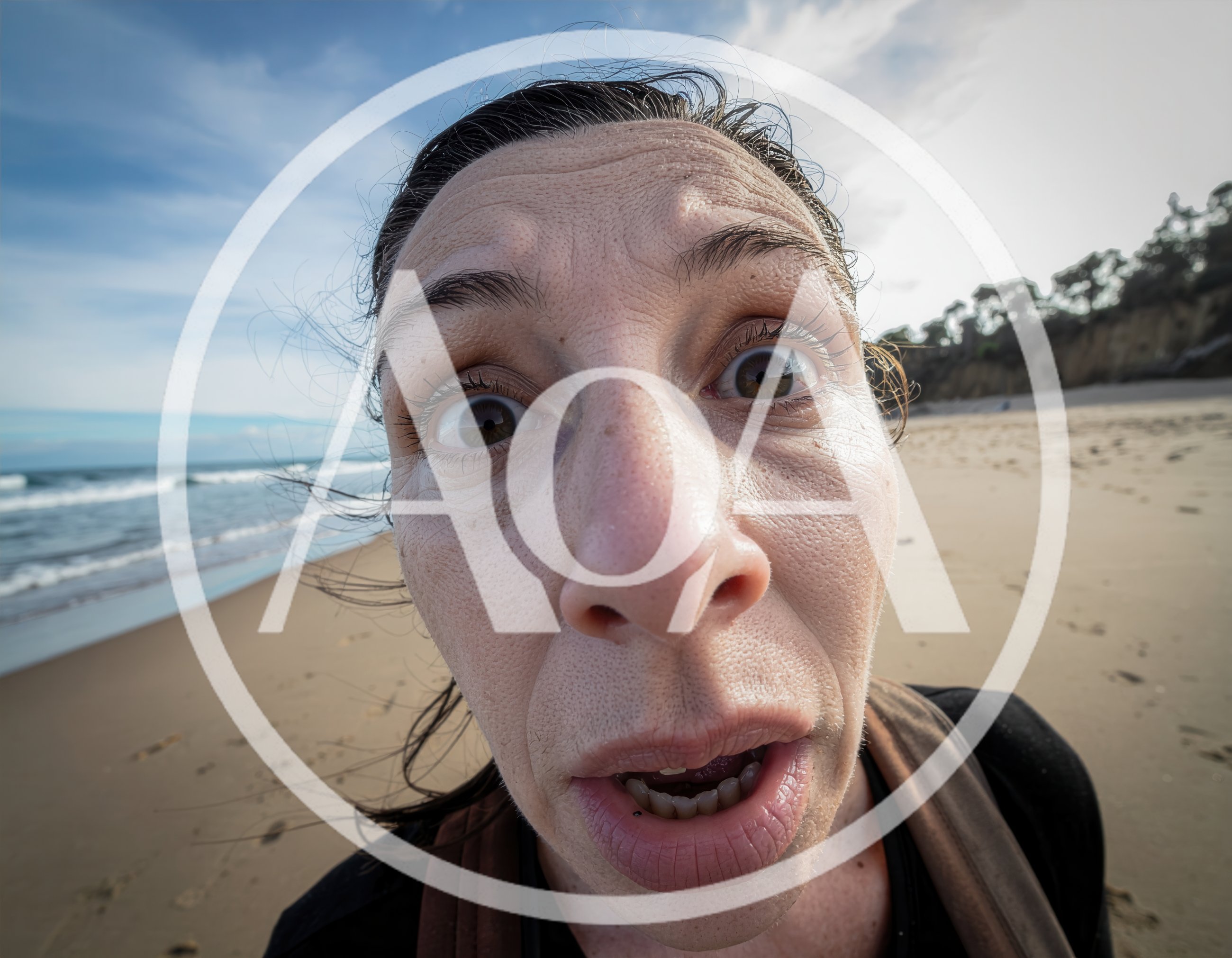 Woman Taking A Wide Angle Selfie On The Beach