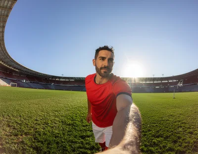 Soccer Player Taking A Selfie On The Pitch