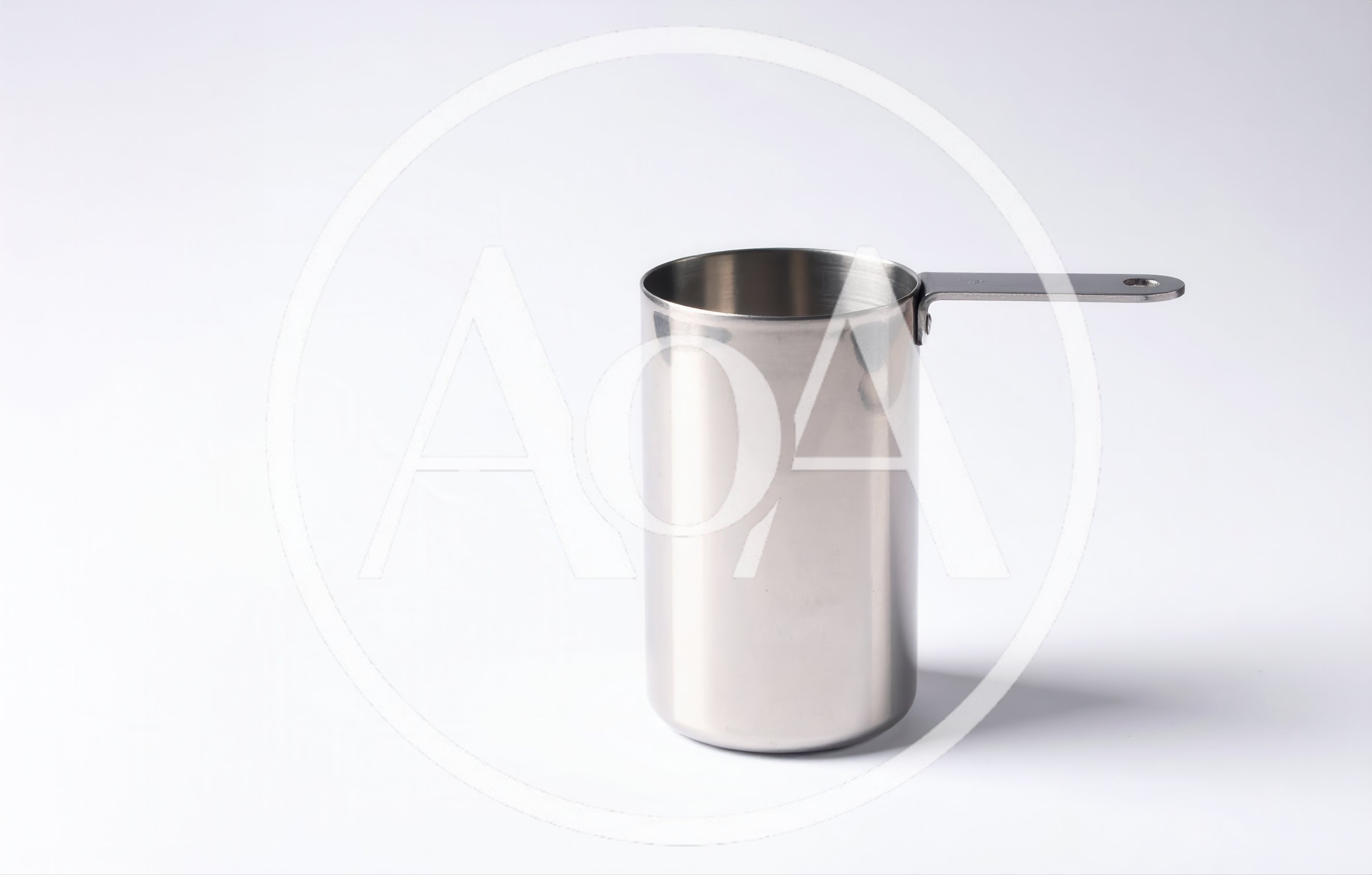Stainless Steel Measuring Cup On White Background