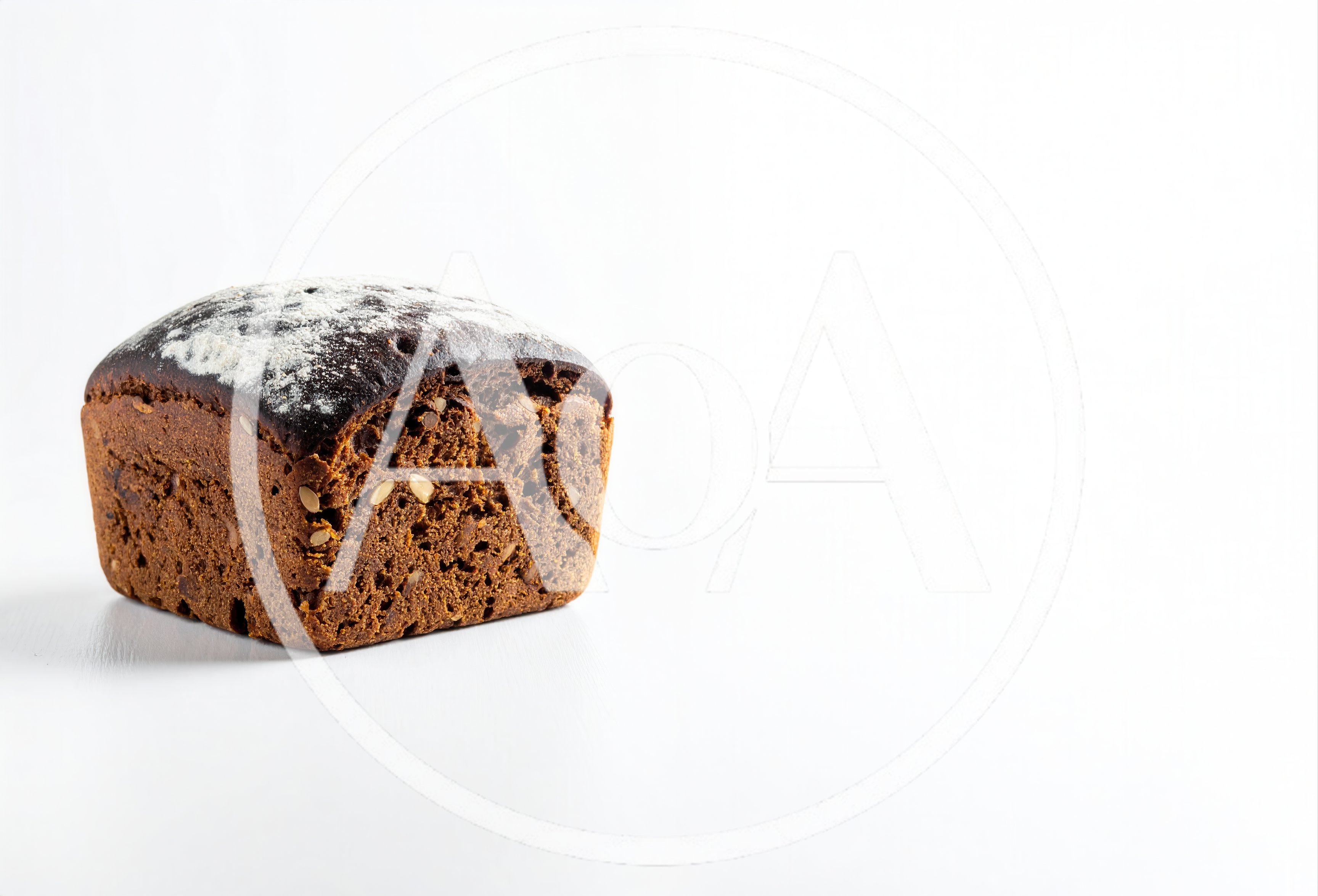 Loaf of Dark Rye Bread on White Background