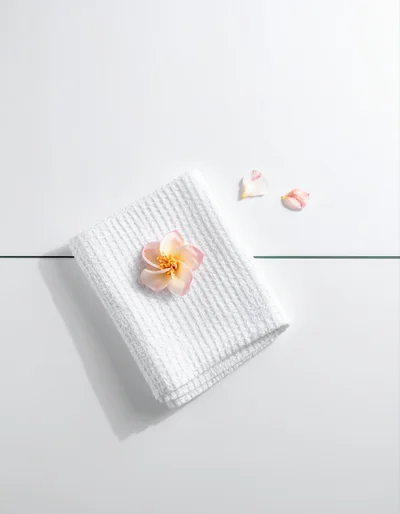 White Waffle Towel With Plumeria Flower
