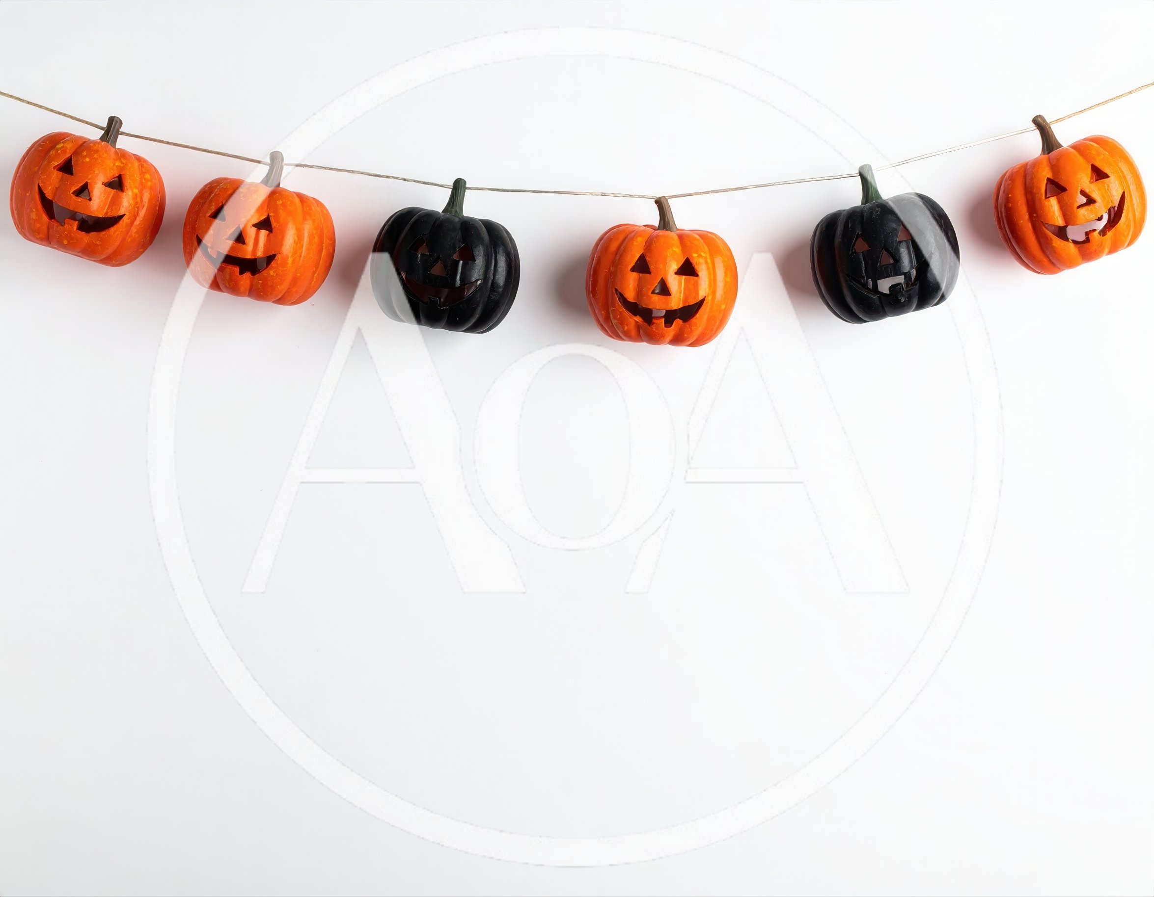 Halloween Pumpkin Garland Hanging On White Background