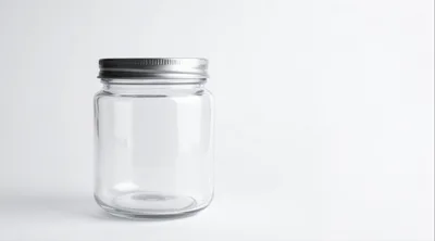 Empty Glass Mason Jar With Silver Lid
