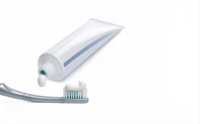Toothpaste Squeezing Onto A Toothbrush