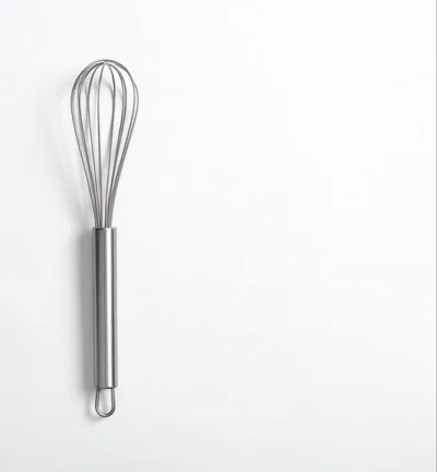 Stainless Steel Kitchen Whisk Isolated On White Background