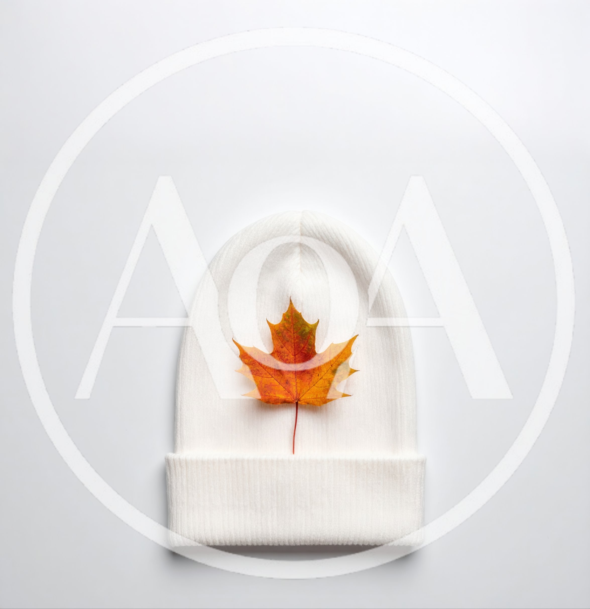 White Knit Beanie With A Single Maple Leaf