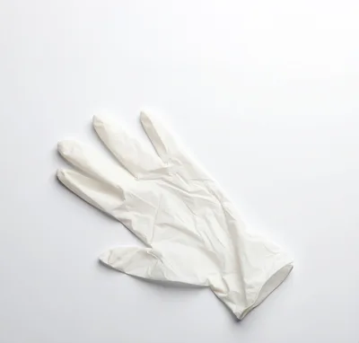 Single White Disposable Latex Glove