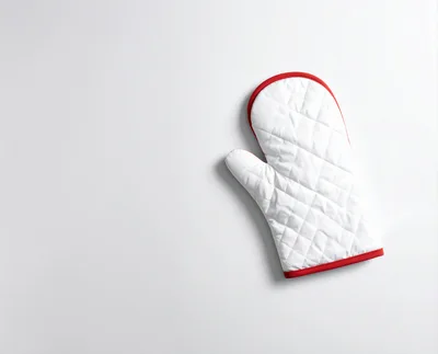 White Quilted Oven Mitt on White Background