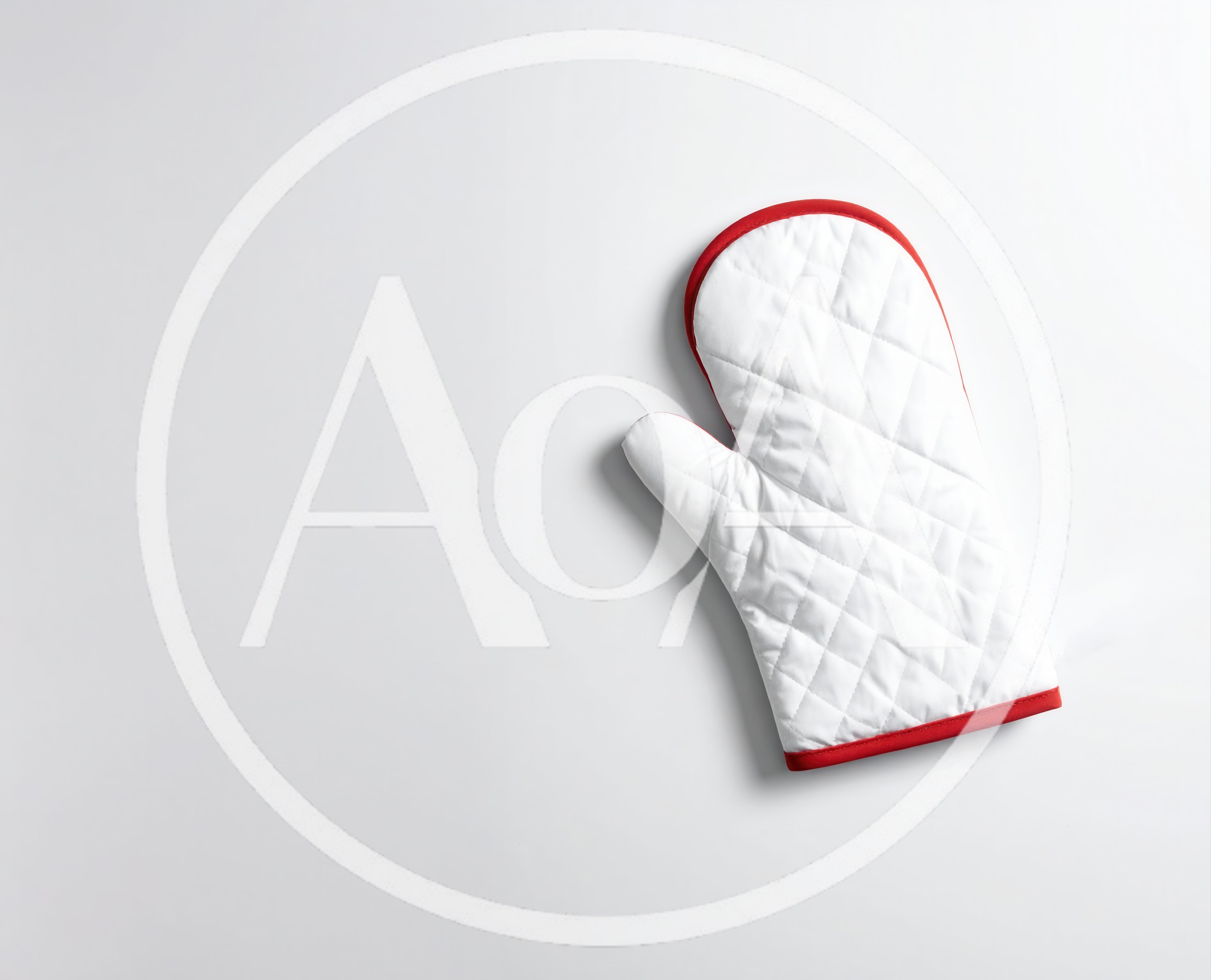 White Quilted Oven Mitt on White Background
