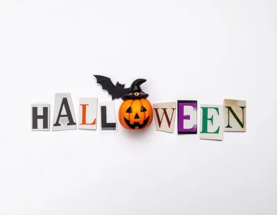 Halloween Text Cutout With Pumpkin And Bat