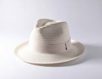 White Straw Fedora Hat On White Background