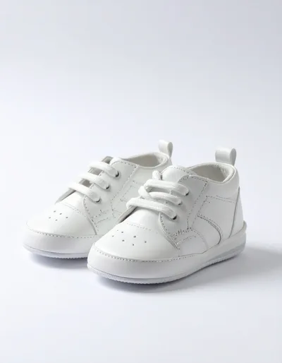 Pair Of White Leather Baby Shoes