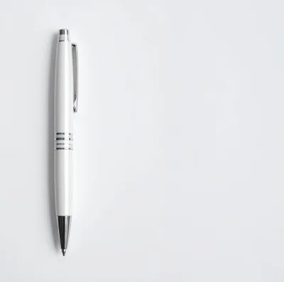 White Ballpoint Pen on Plain White Background
