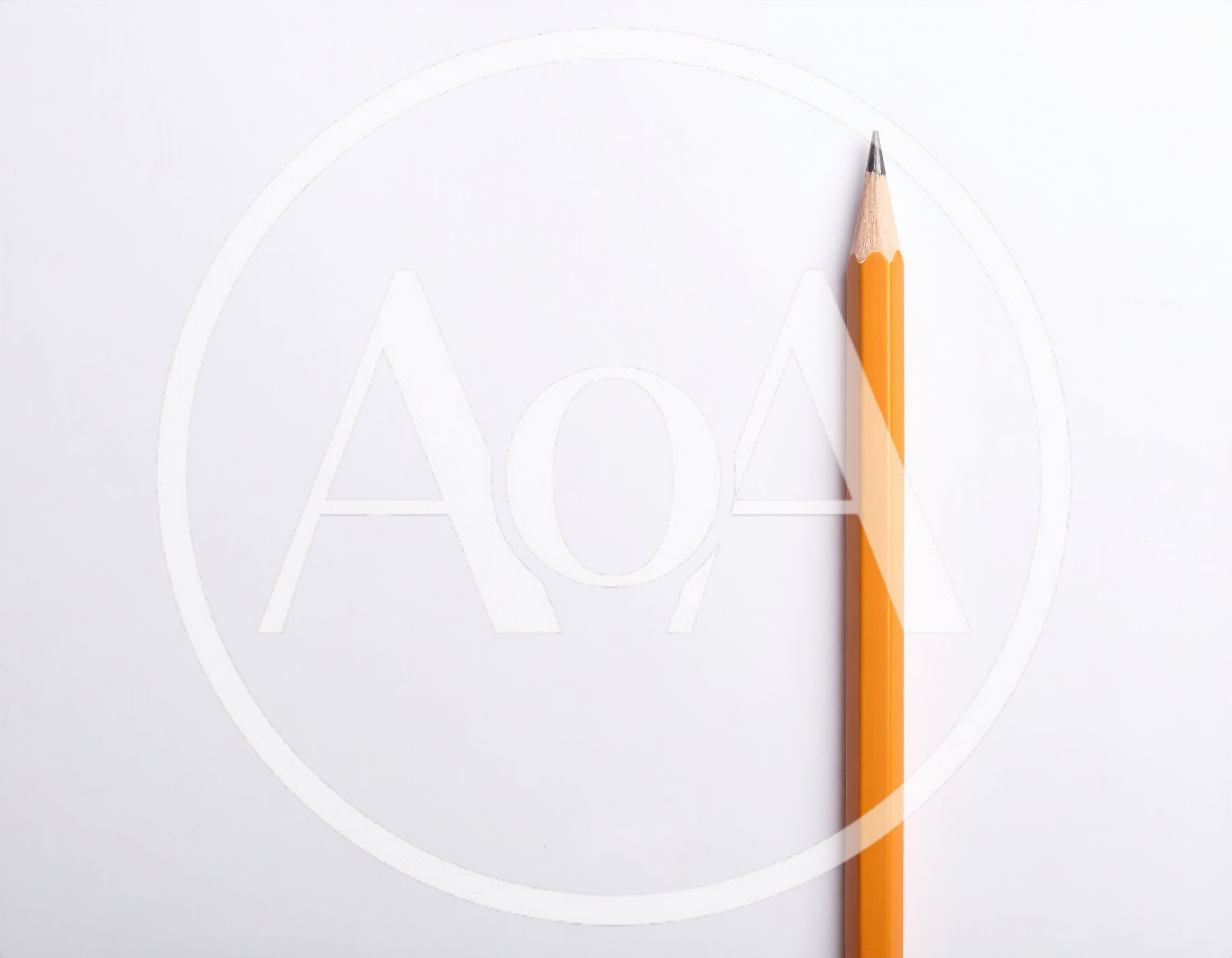Yellow Pencil Standing Vertically On White Background