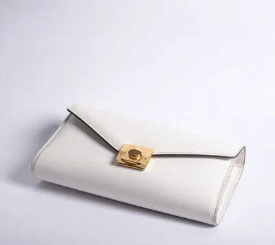 Elegant White Leather Clutch Bag With Gold Hardware