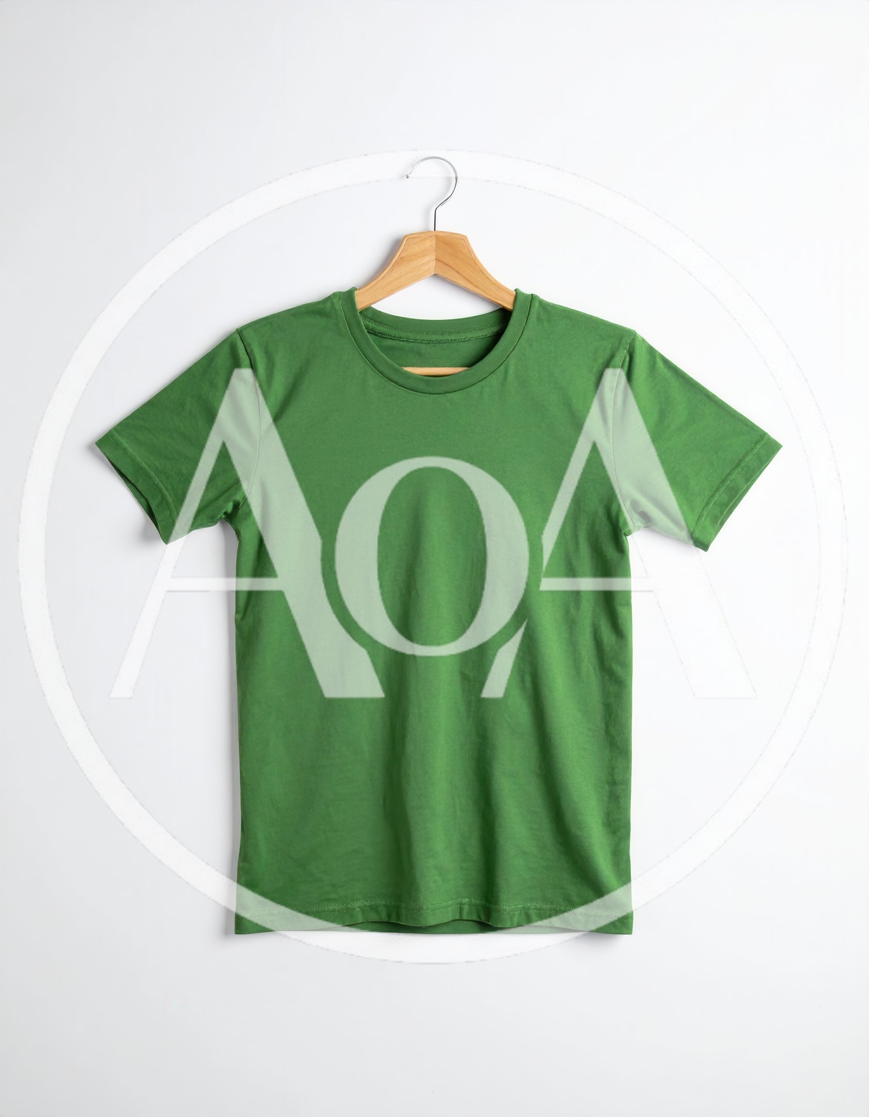 Green T-Shirt Hanging on Wooden Hanger
