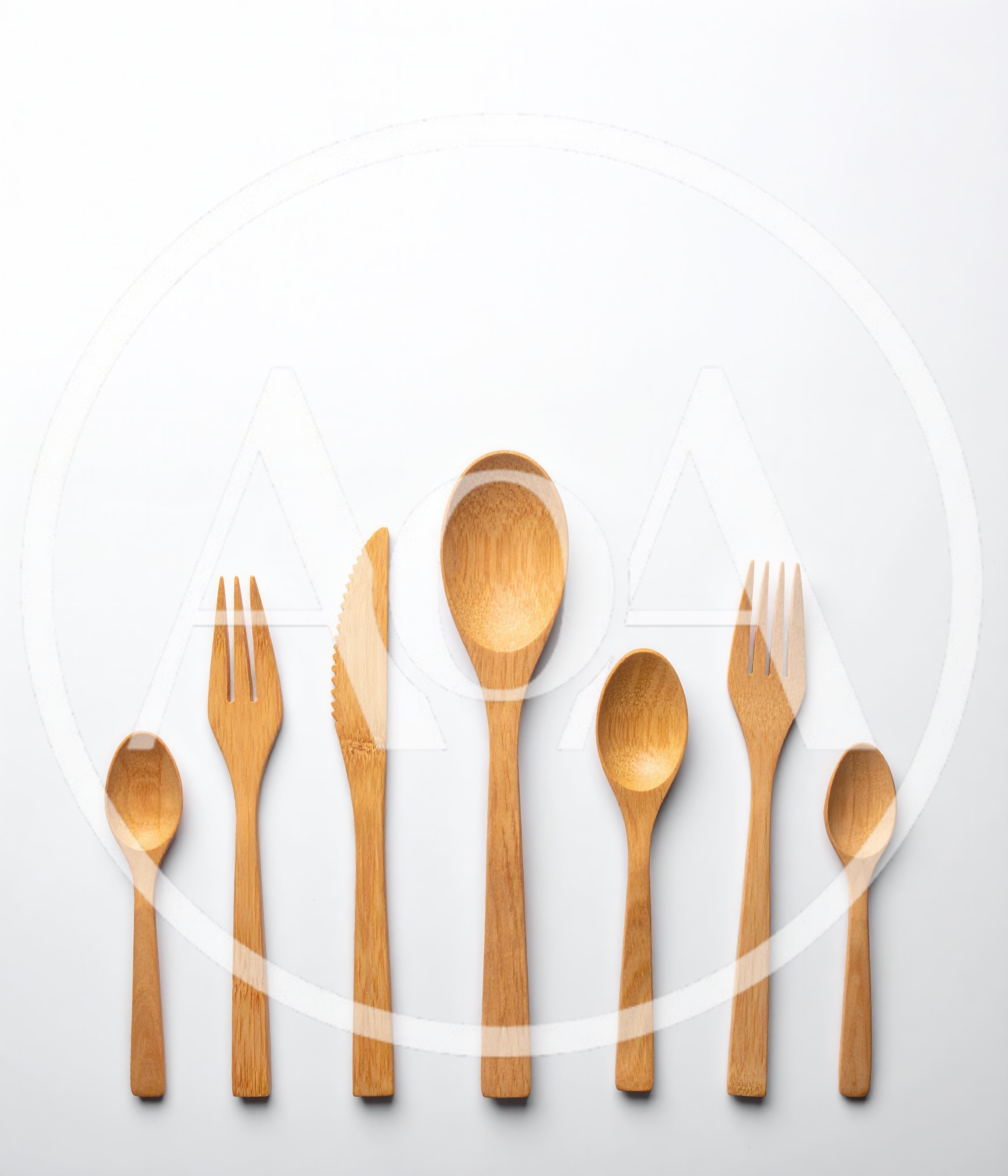 Set Of Wooden Cutlery On White Background