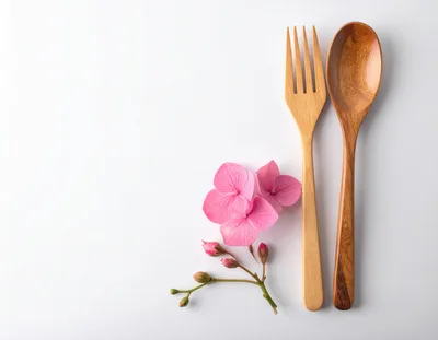 Wooden Fork and Spoon with Pink Hydrangea Flowers