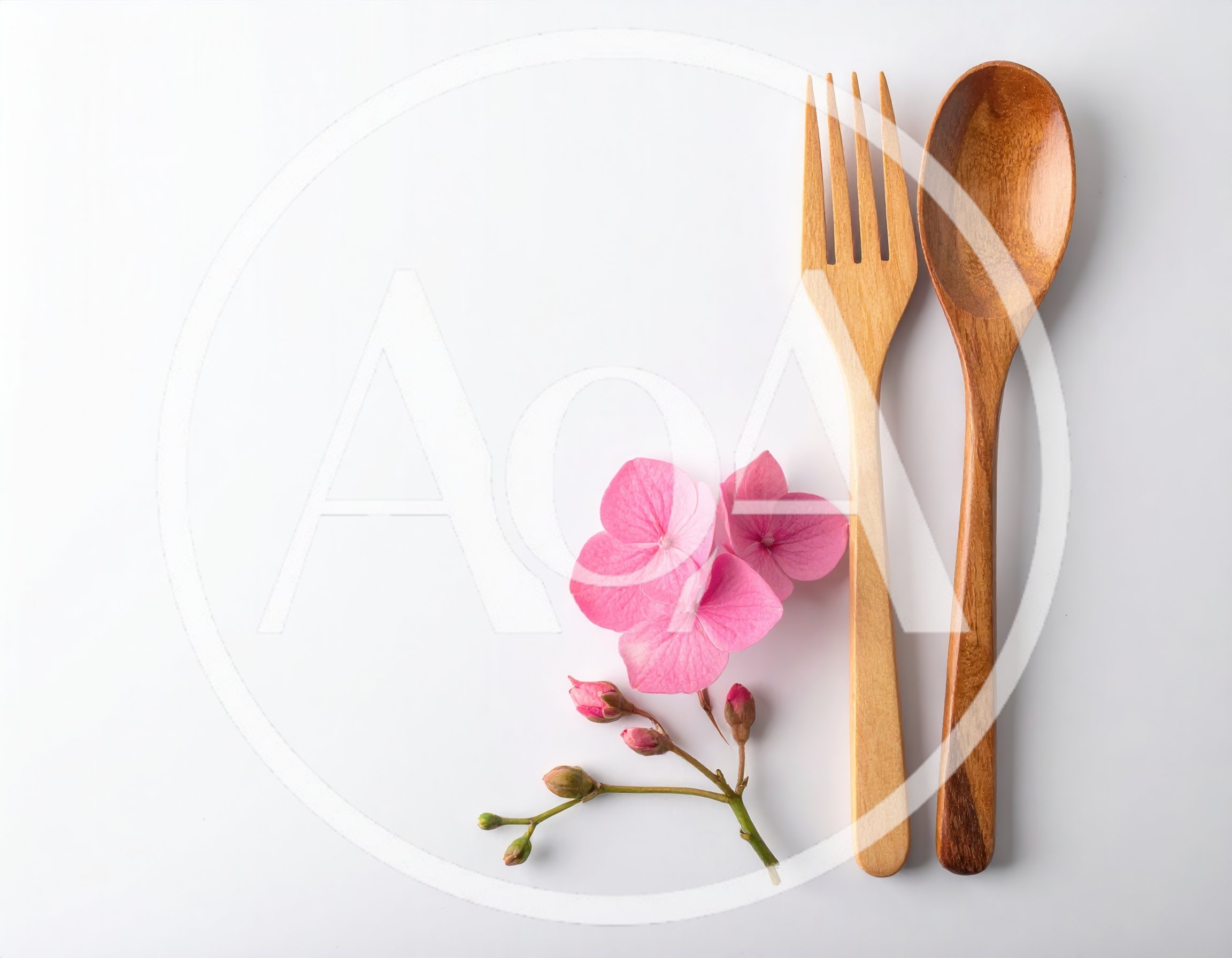 Wooden Fork and Spoon with Pink Hydrangea Flowers